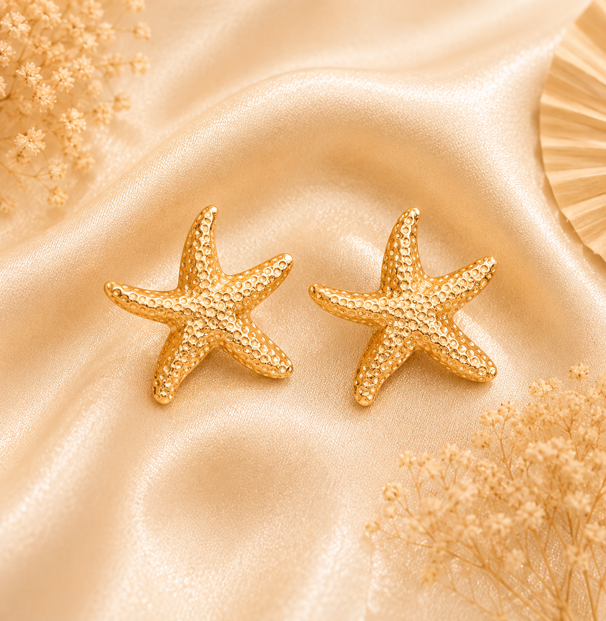 Boucles étoiles de mer doré